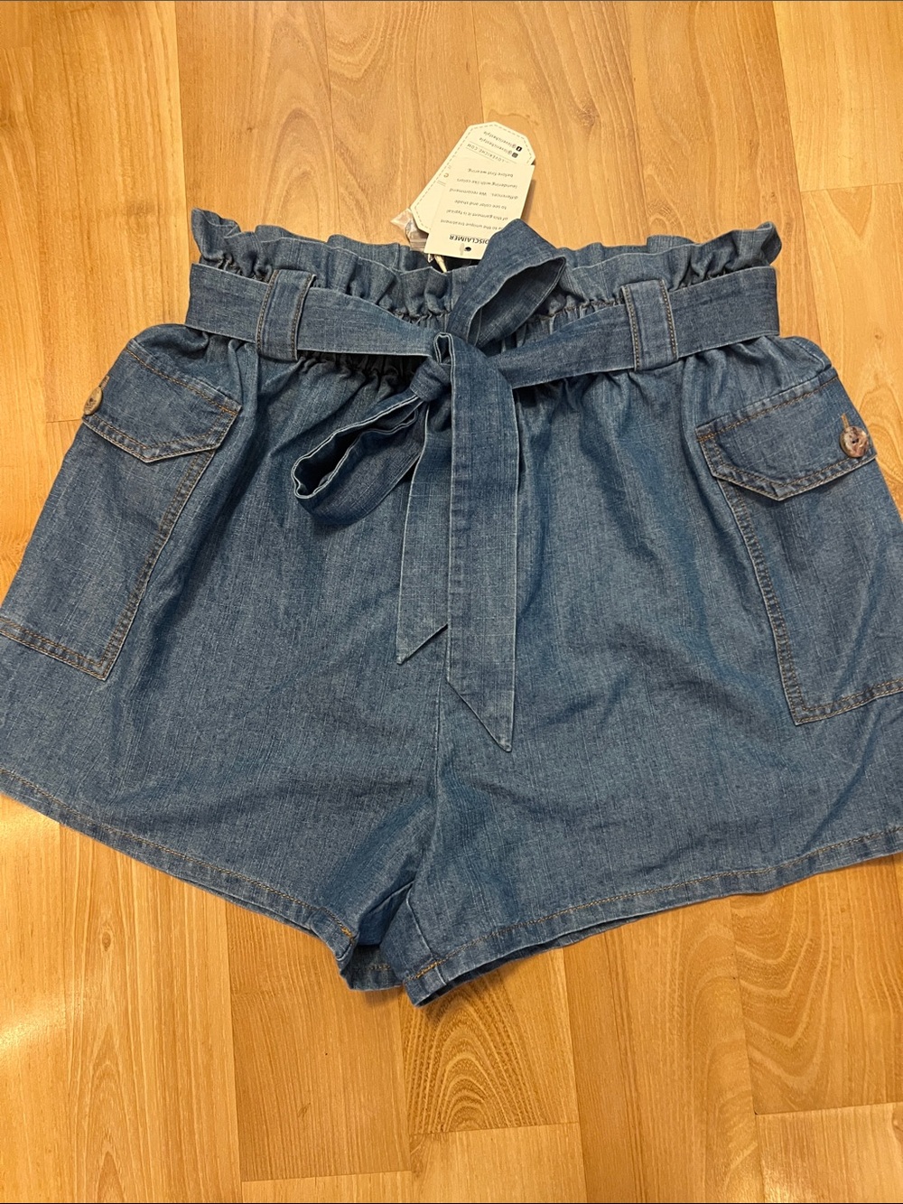 Dark blue belted shorts tie and elastic waist. Side pockets L